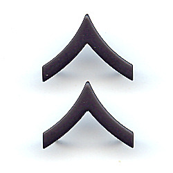 A. Private First Class (PFC) Black Metal Chevrons