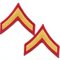 A Private First Class (PFC) Dress Blues Chevrons